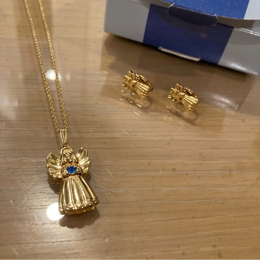 Vintage 90’s Avon Golden Heavenly Angel Pendant/Clip on Earrings. Blue Stone